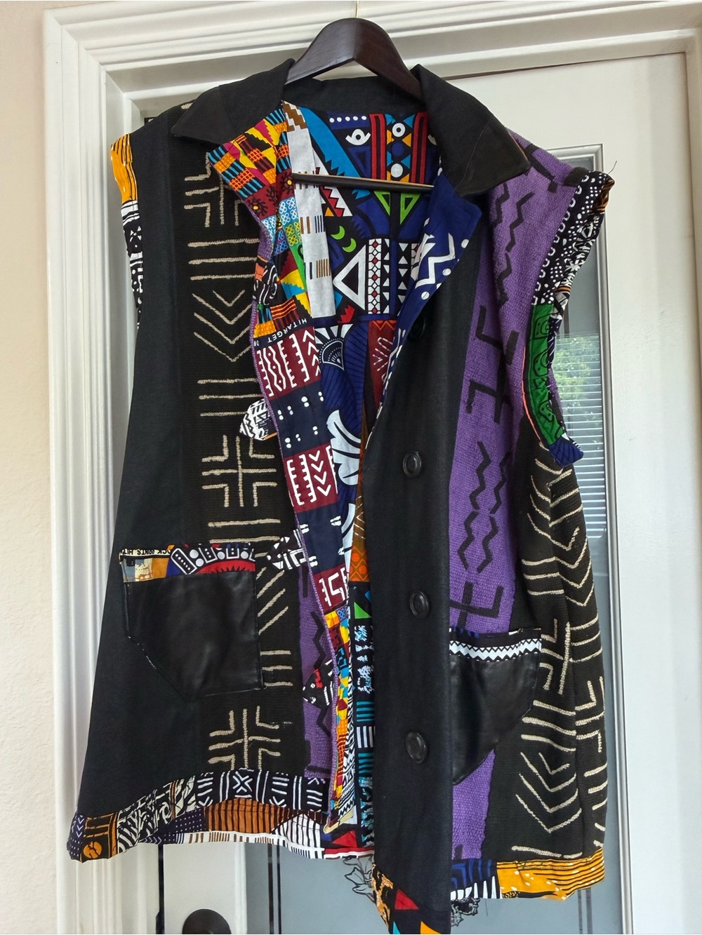 Like new, mixed mud-cloth vest. The vest is reversible for two chic looks.
